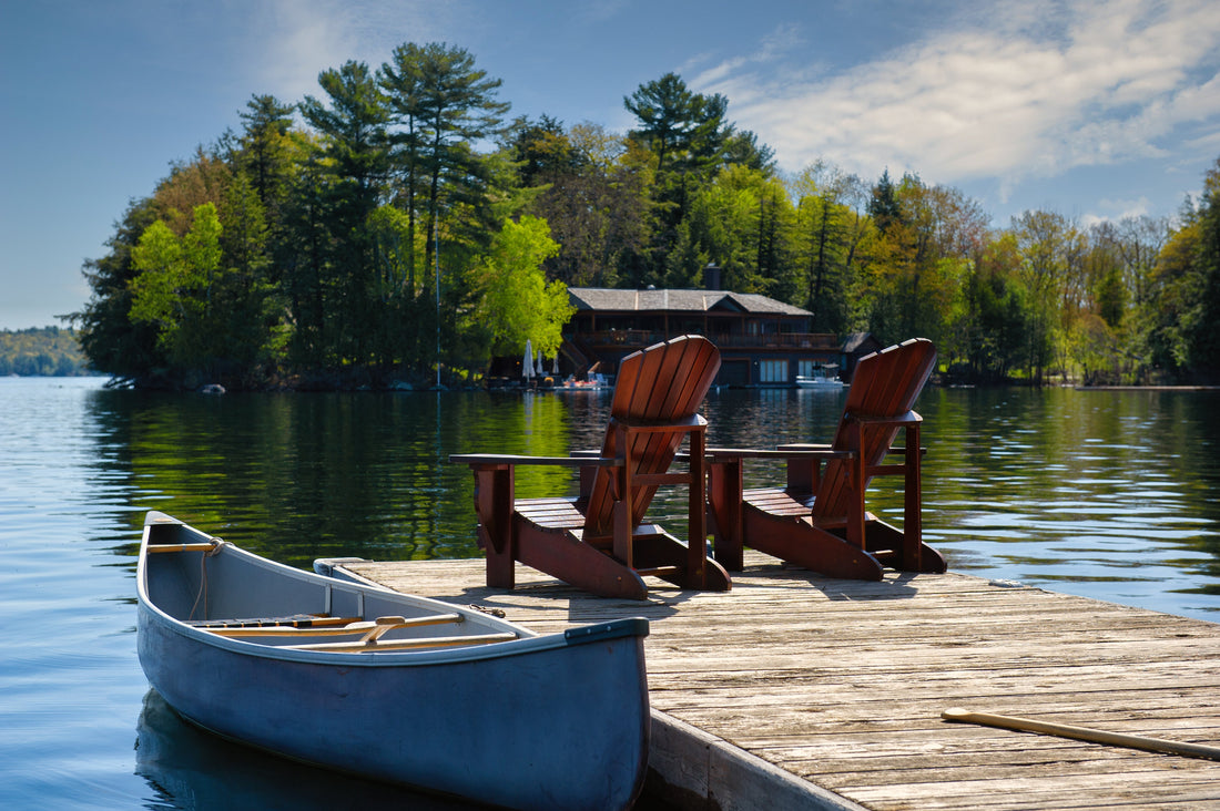 canoe and chairs on the dock